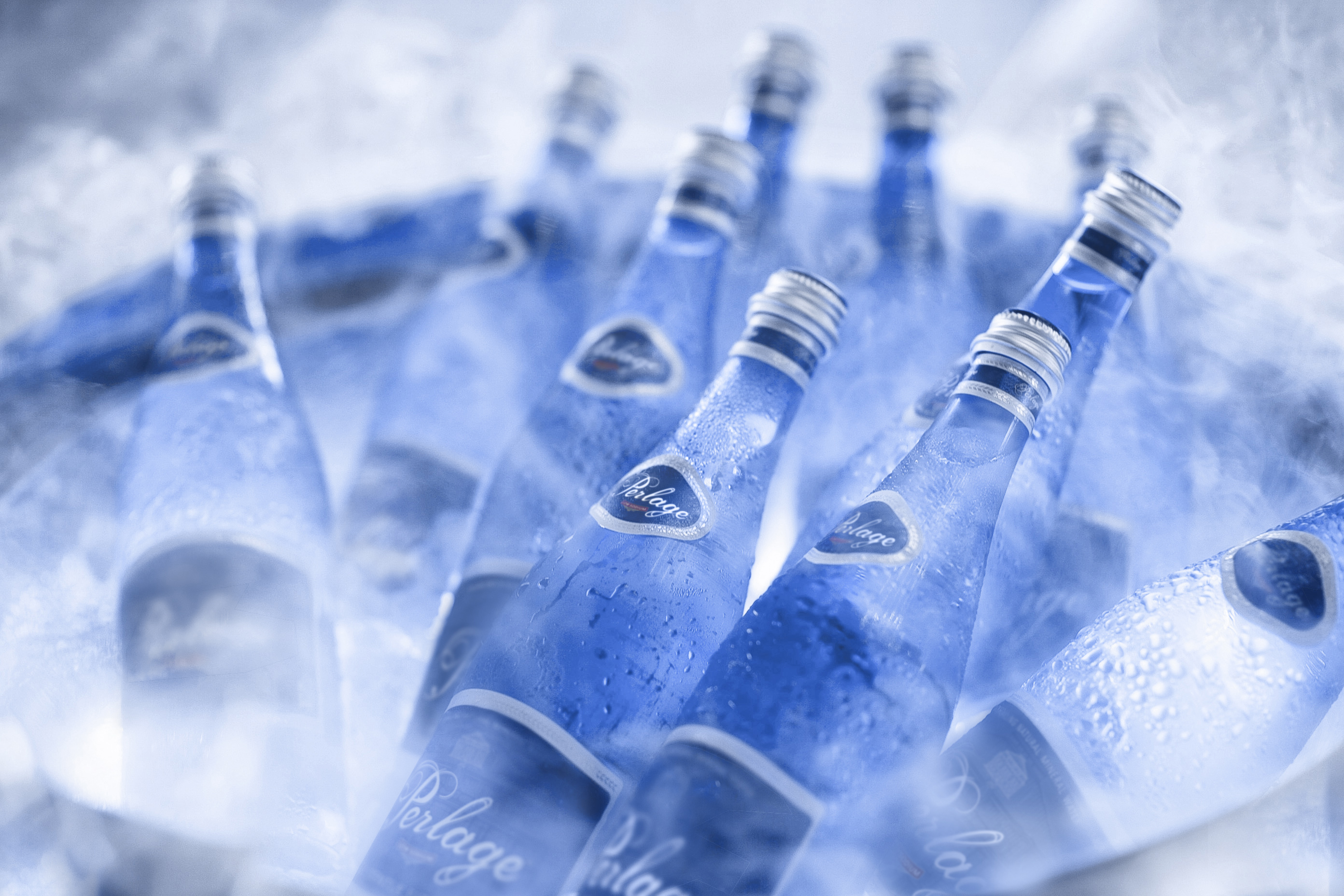 Chilled PERLAGE bottles in ice