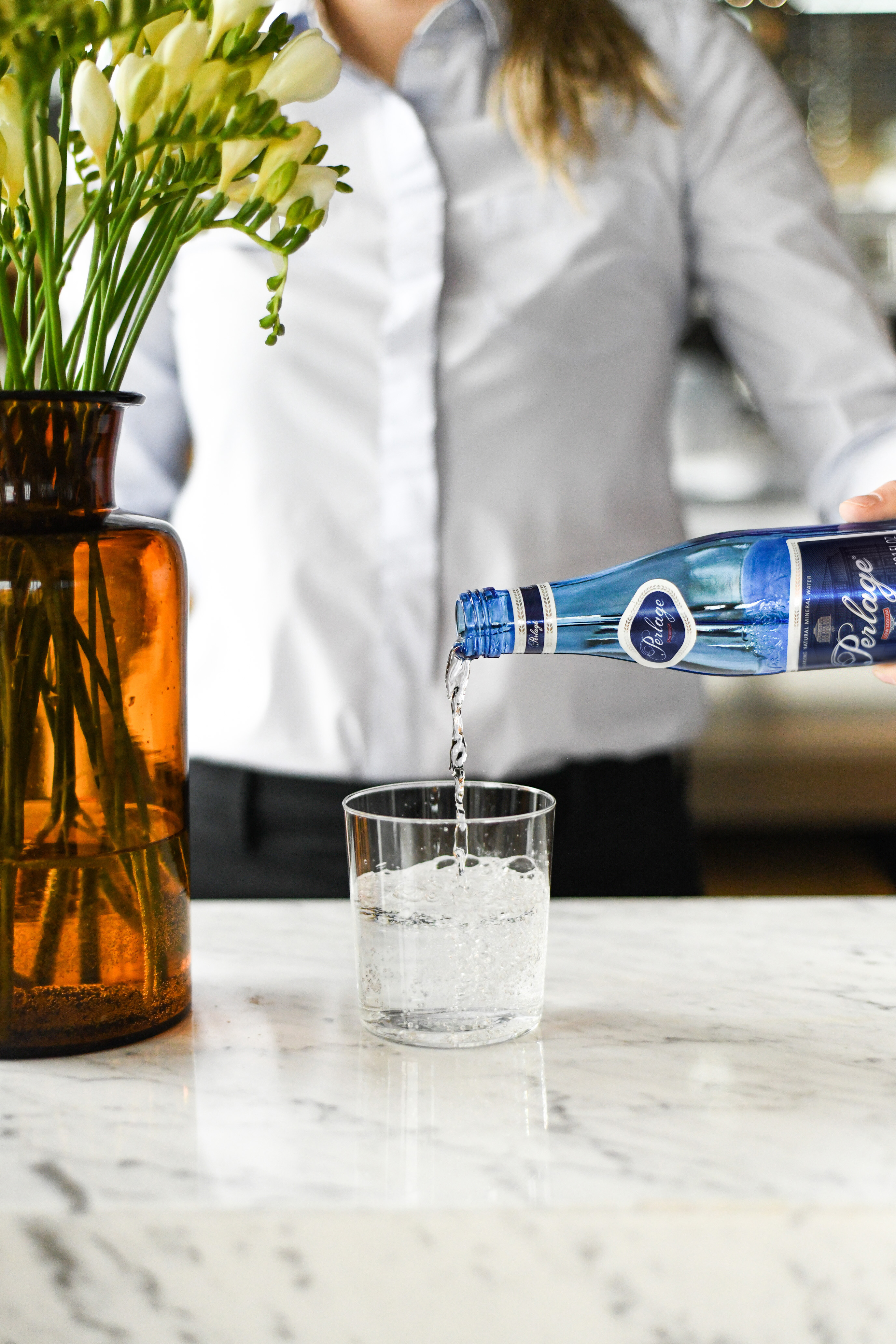 PERLAGE being poured into a glass