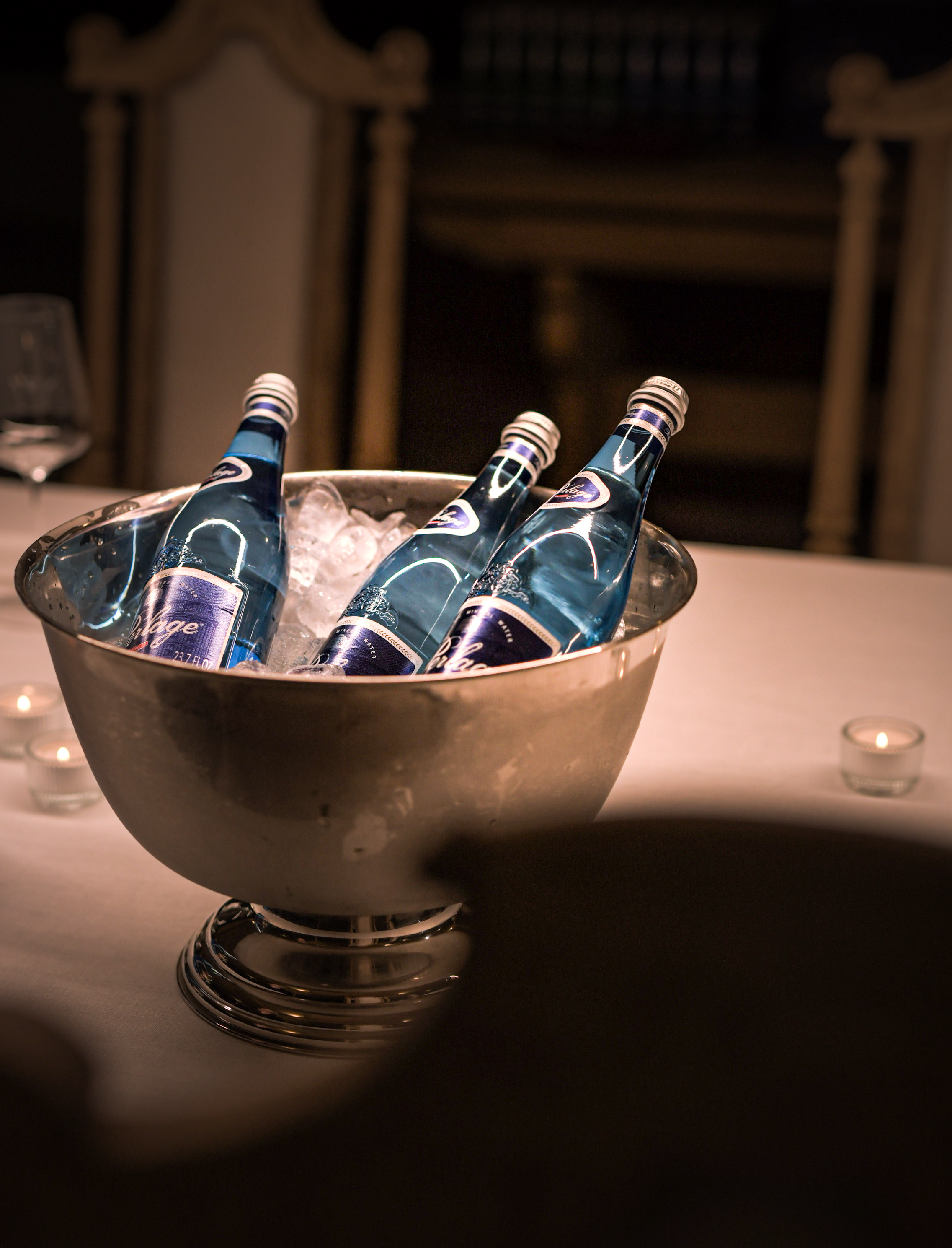 PERLAGE bottles in an ice bowl during a tasting
